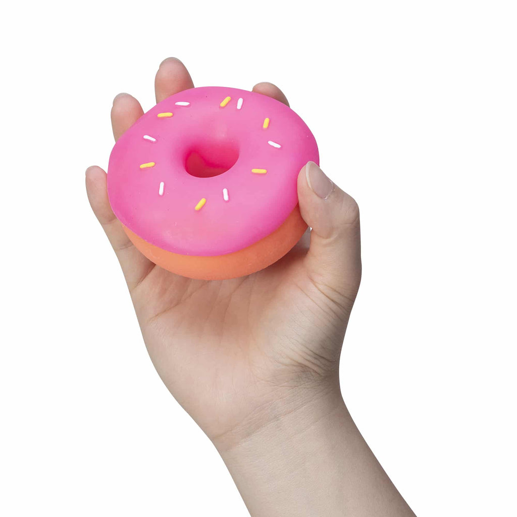 NeeDoh Dohnuts T8 Orange with Prink Frosting and Sprinkles in Hand