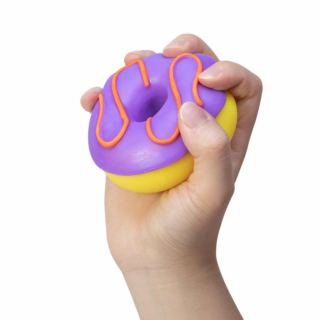 NeeDoh Dohnuts T8 Yellow with Purple Frosting and Orange Icing in Hand