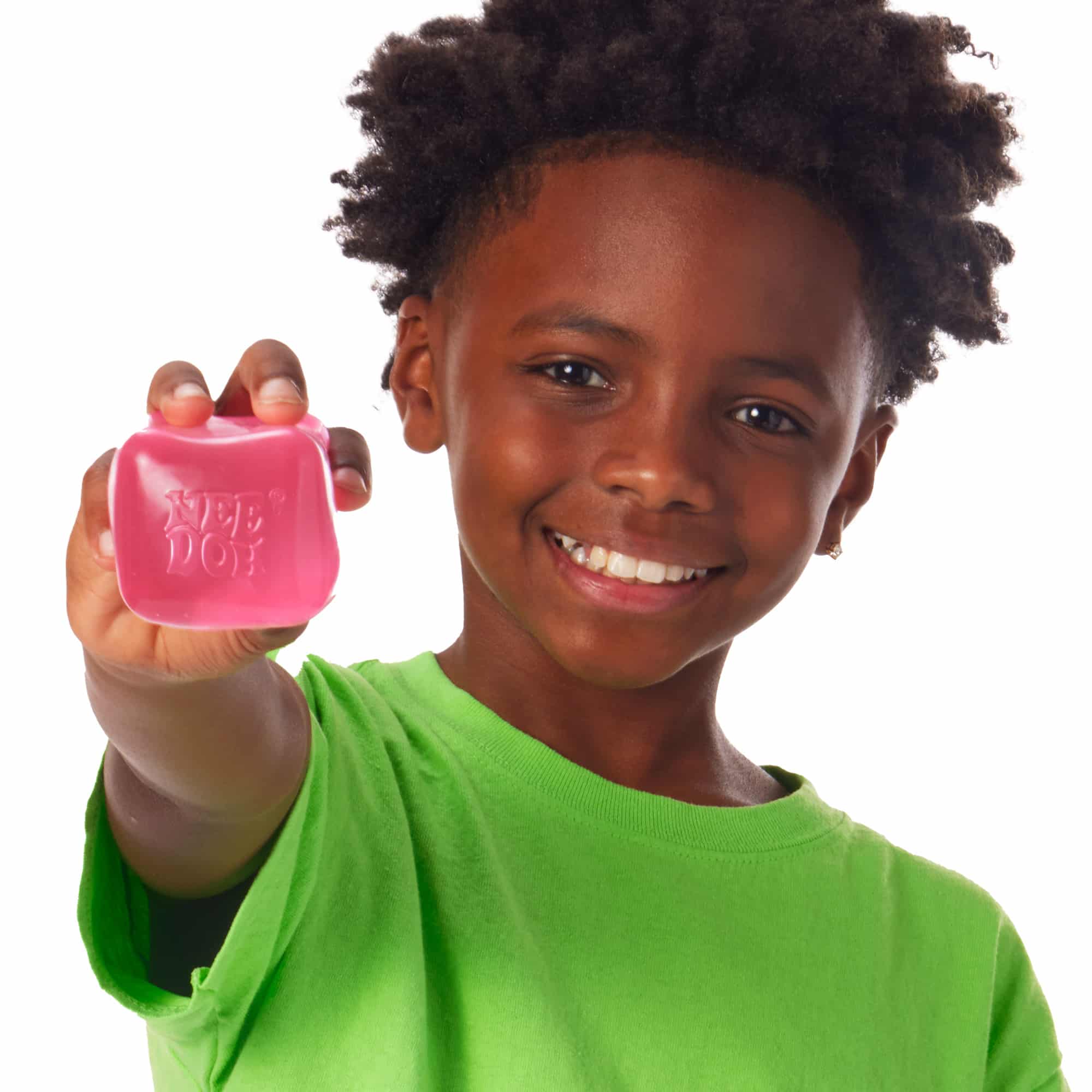 NeeDoh Nice Cube X7 Lifestyle of boy squeezing pink Nice Cube X7