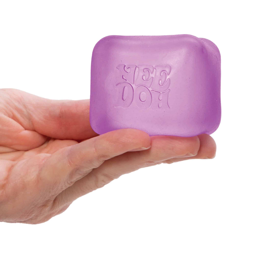 NeeDoh Nice Cube X7 Purple Held in Hand