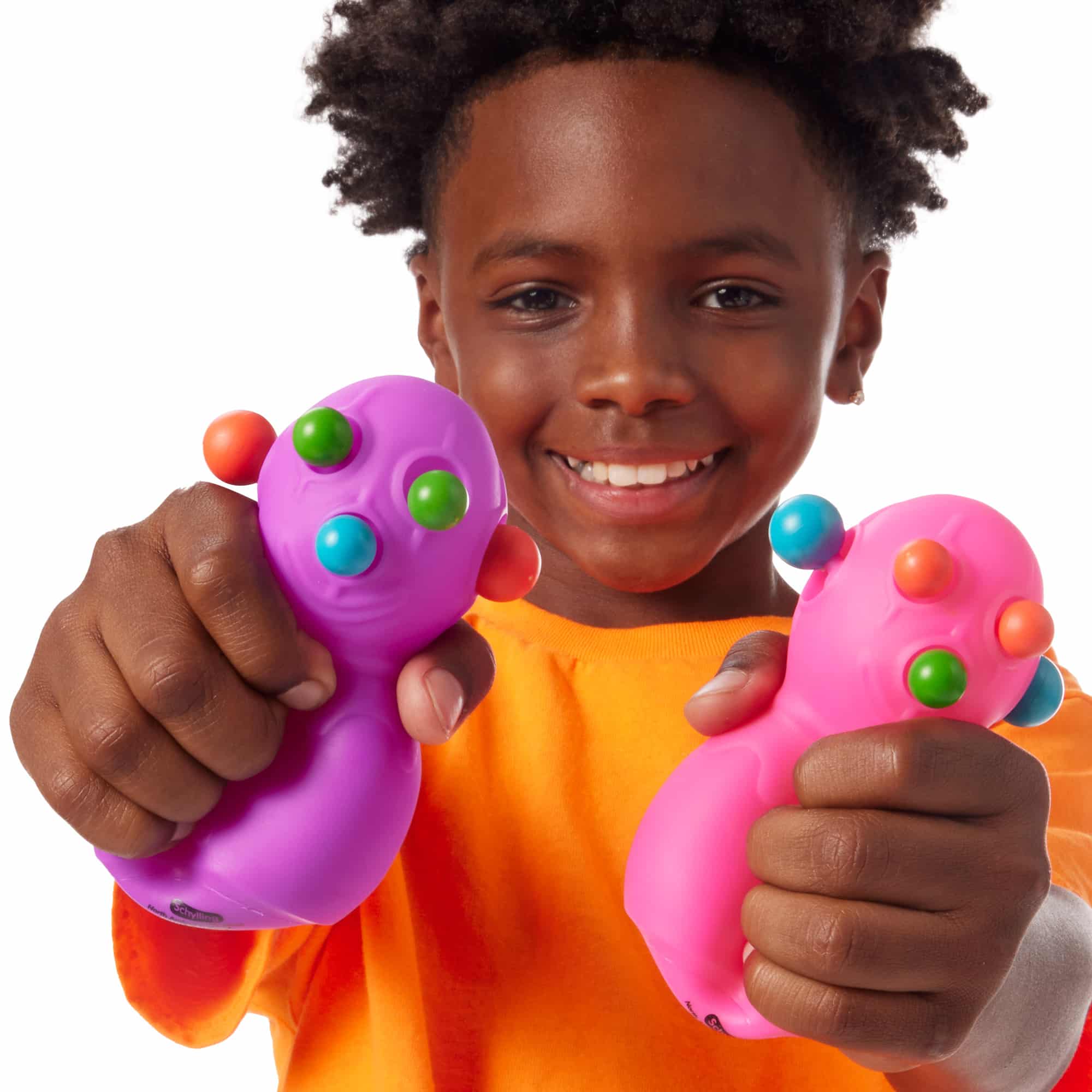 NeeDoh Panic Pete K2 Lifestyle with boy squeezing purple and pink Panic Pete K2s