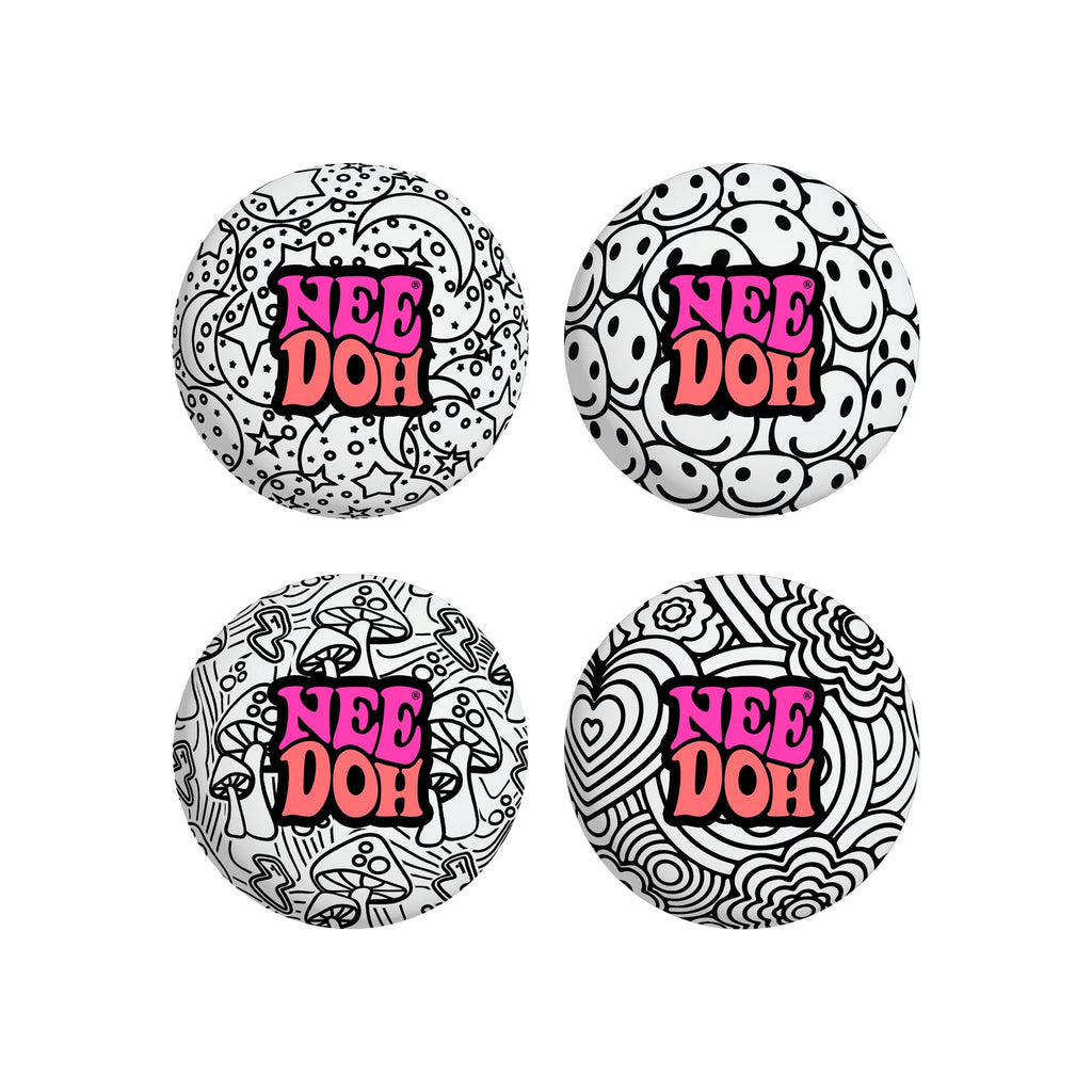 Four different black-and-white patterned NeeDoh Press-Doh C9 sensory squish balls. Patterns include mushrooms, smiley faces, flowers, and stars. Text on each reads "NeeDoh".